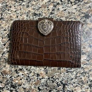 BRIGHTON wallet. Very nice. Lots of room.